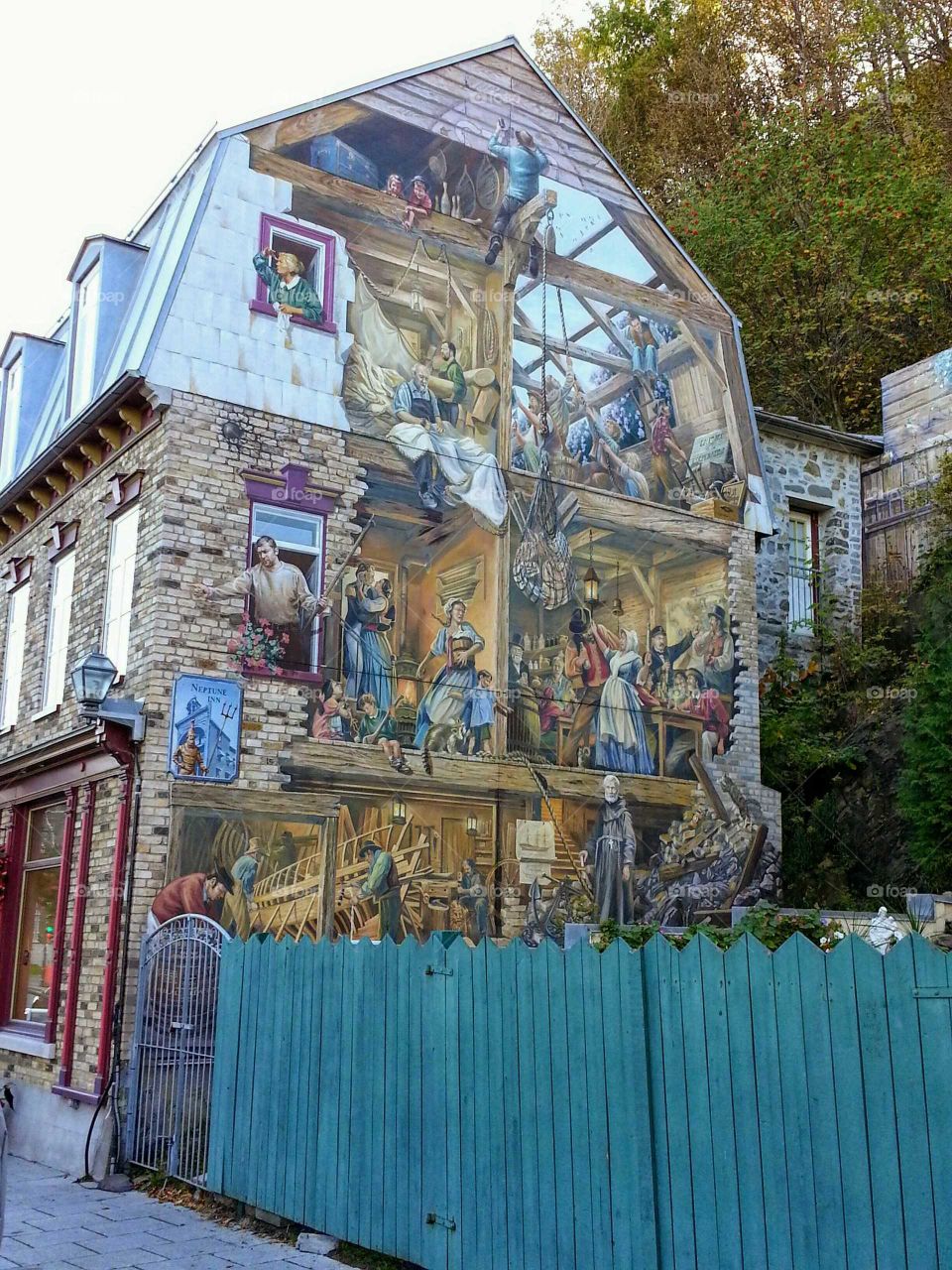 A mural on a brick wall in Old Quebec