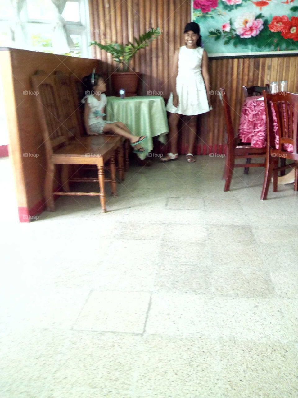 two friends that have not see each other in along time and they see see each other an they very happy to see  each other.