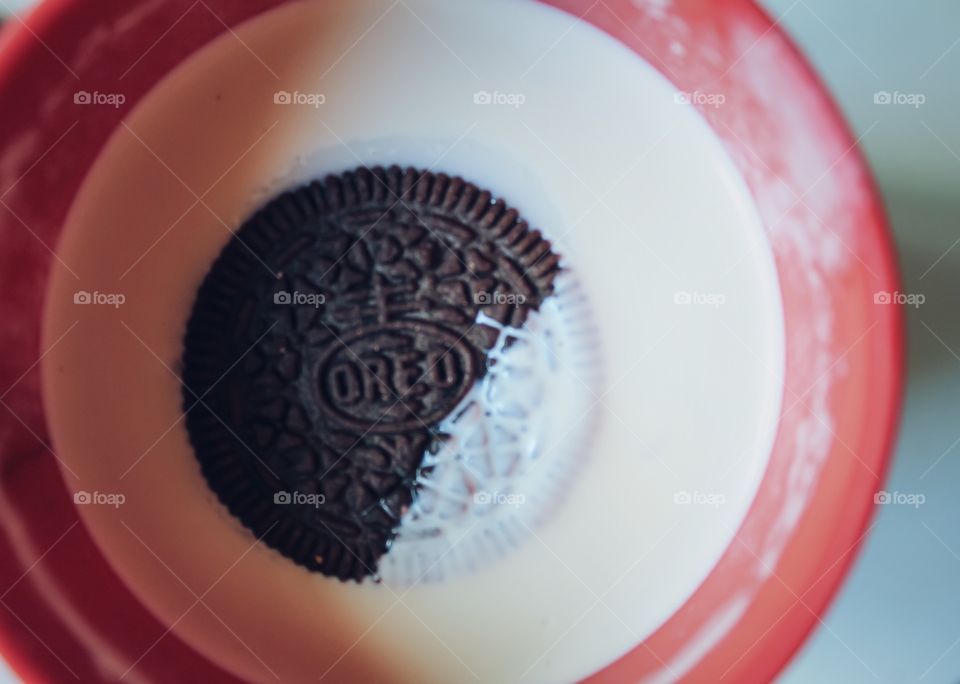 Oreo with a glass of milk