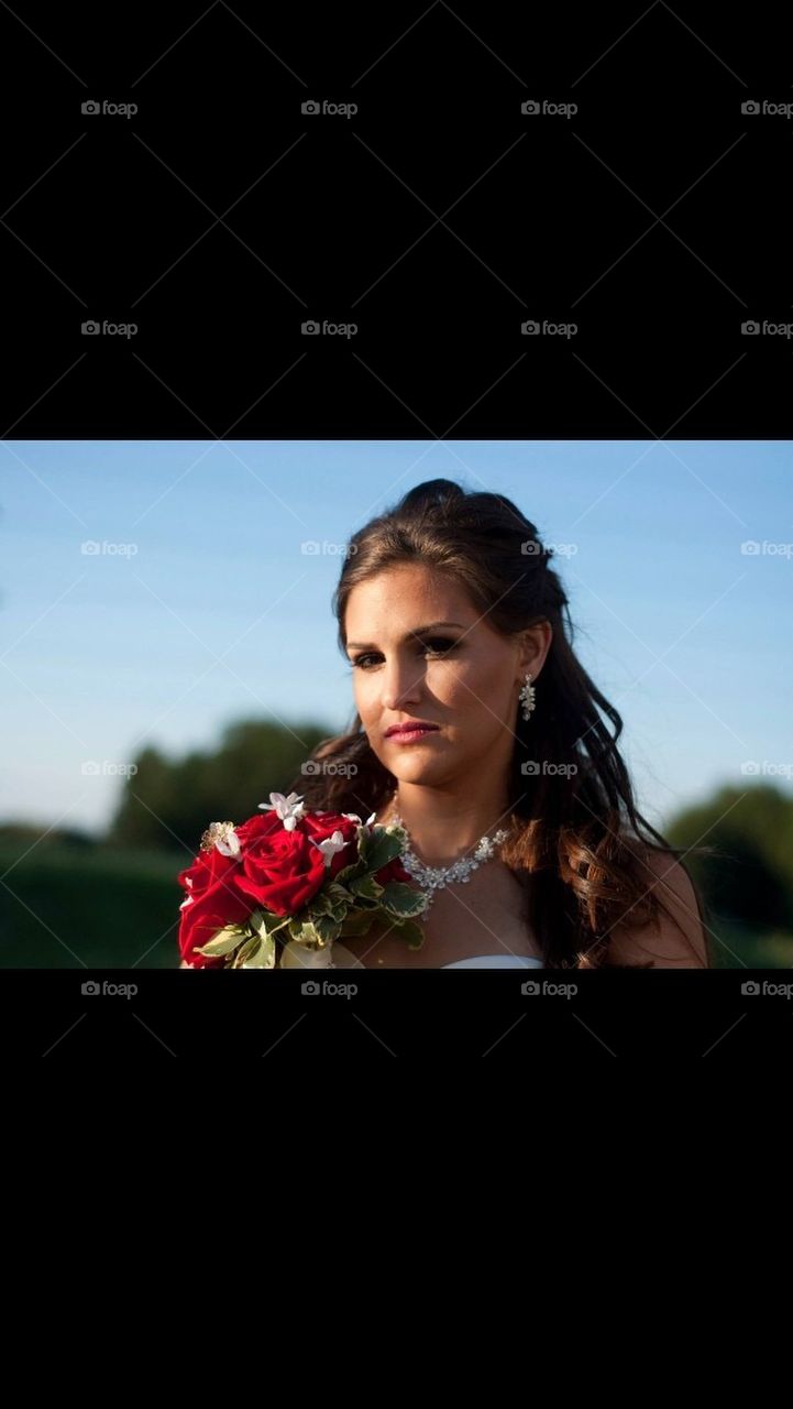 Bride with Red Roses