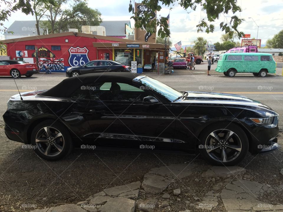 Black Mustang. Black Mustang stand in the ruote 66