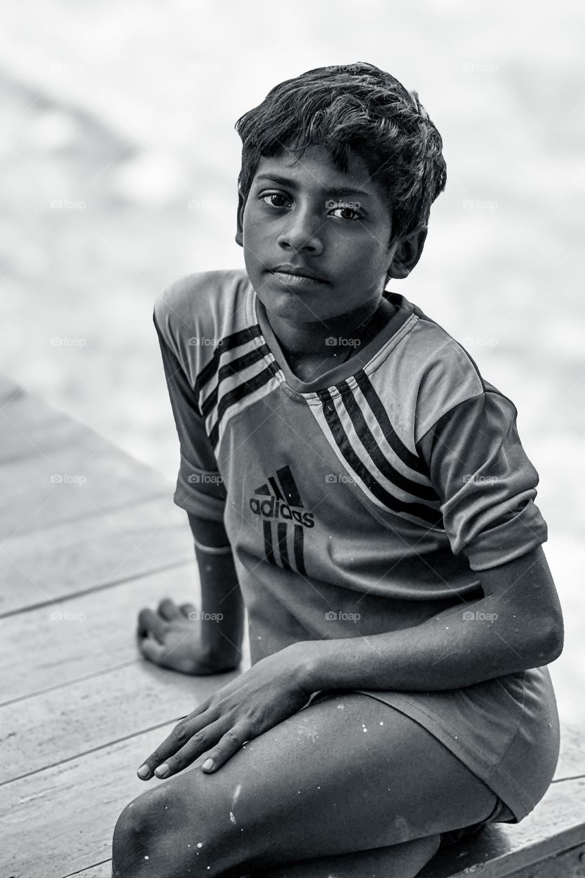 Black and white portrait of a child from indian village