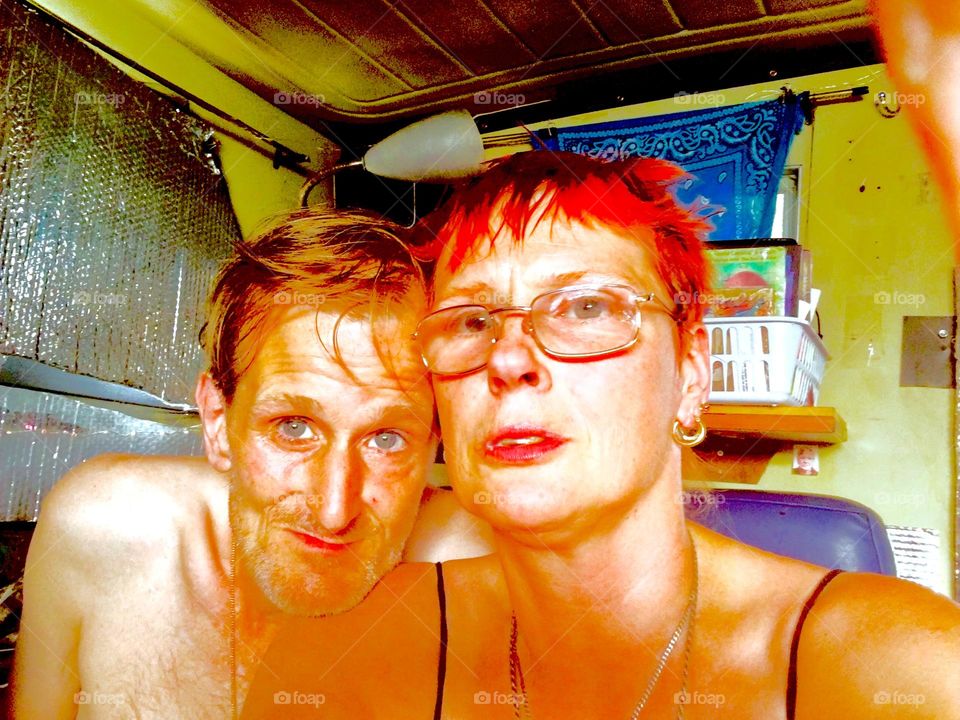 „Petra Schiller“ and „Timothy Trespas“ are taking a portrait photograph aboard the „Salvation“, our „28 ft 1969 Luhrs“ cabin cruiser at „Newtown Creek“ by the „Pulaski Bridge“ in LIC, Queens. 2019. Hypnotic Productions