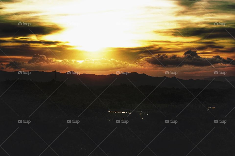 Scenic view against sky during sunset 