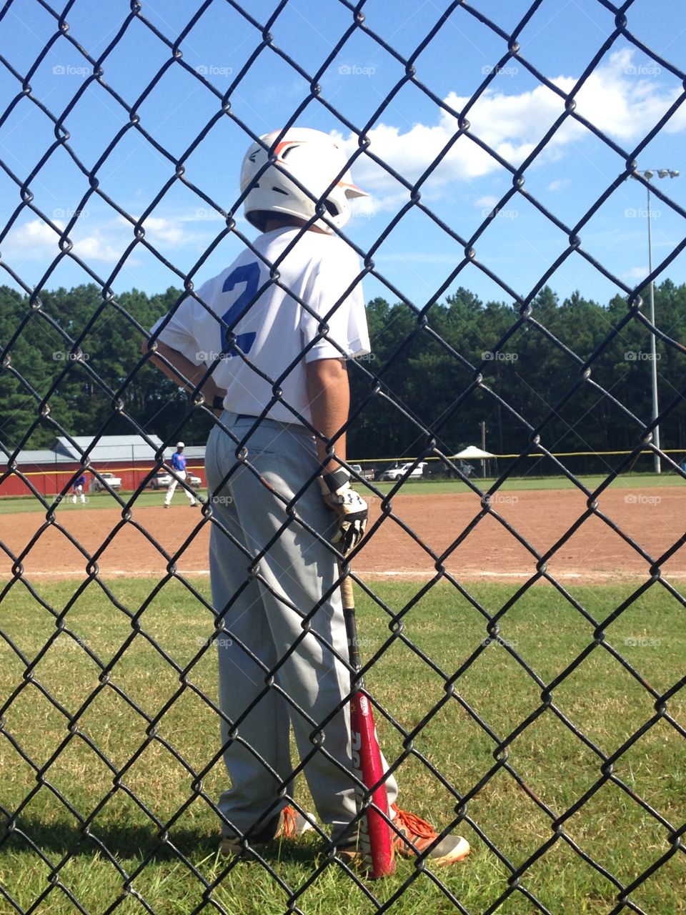 Rear view of baseball player