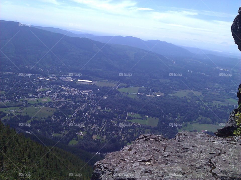 A town seen from a hill. The town is North Bend in Washington State.