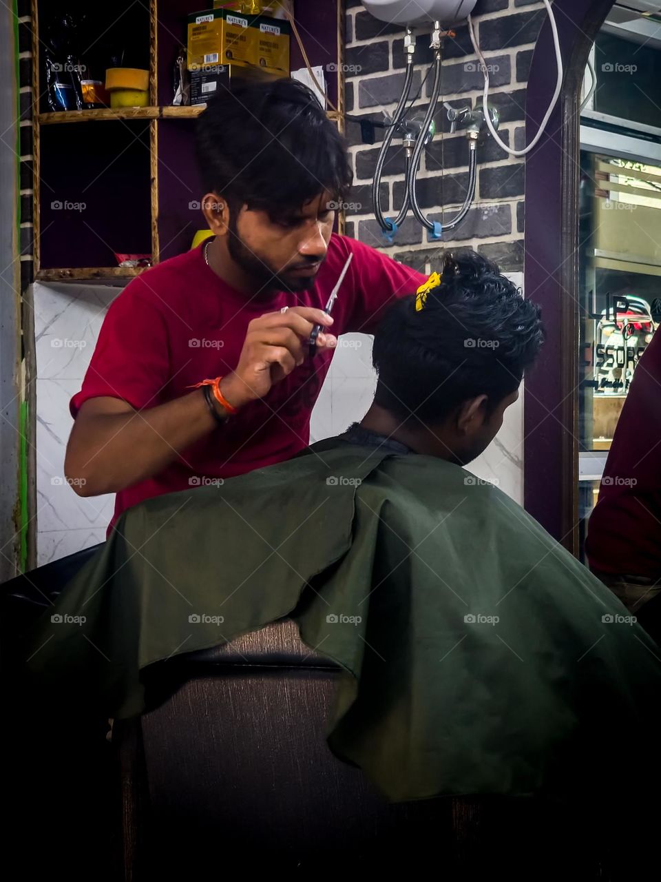 Barber cutting hair