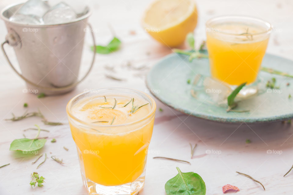 Orange juice in a mini cup