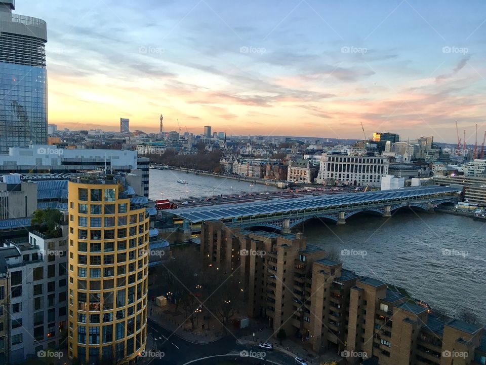 View of London and the Thames River at sunset