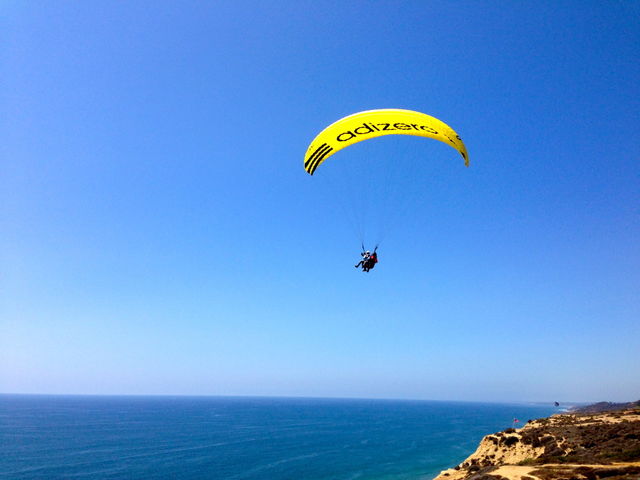 Parasailing. Parasailing over the ocean 