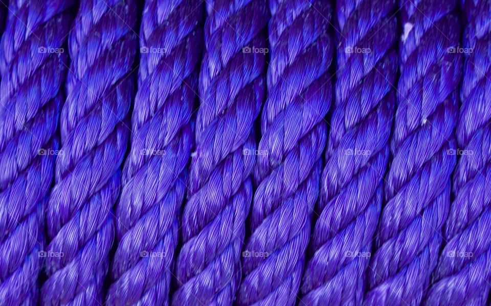 Full frame of blue braided rope