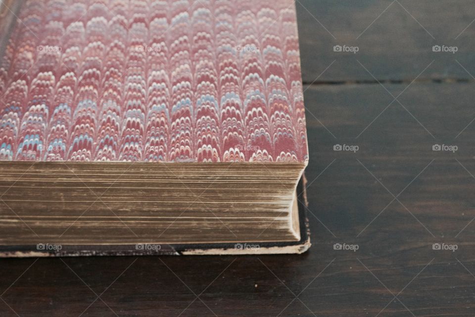 Minimalistic Snaps - inside cover of an antique book showing tradition "flame" pattern