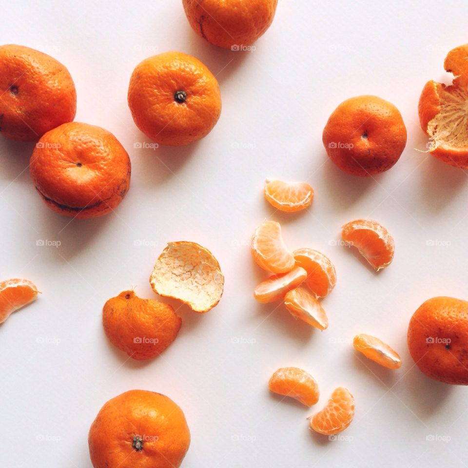 Fresh oranges on a white background