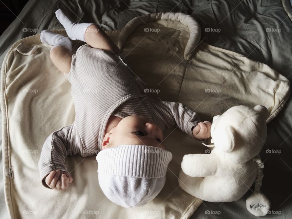 Baby with soft toy 