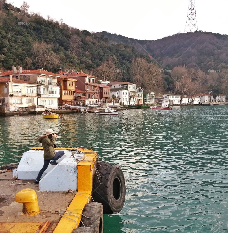 Take pictures by the sea , a fishing town in Istanbul