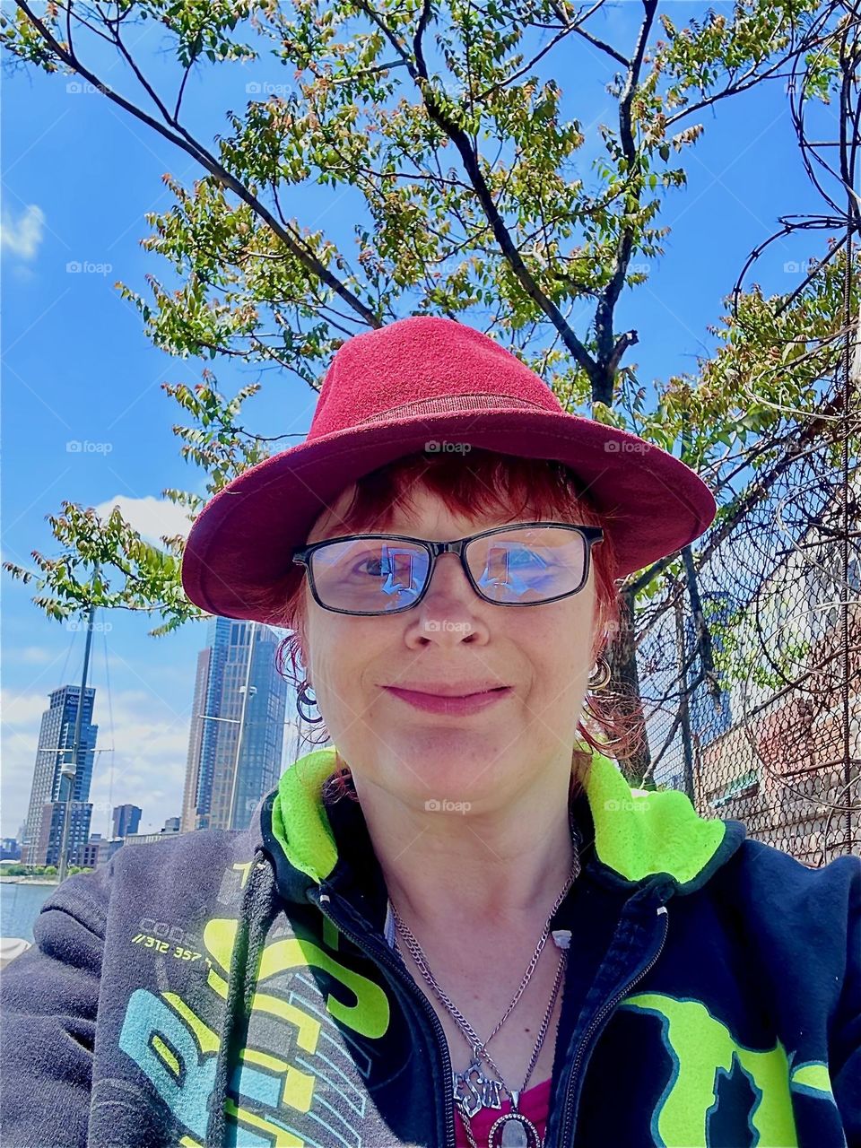 This is me, “Petra Schiller” a.k.a. “Maxine Firefox” standing in the parking lot underneath the “Pulaski Bridge” at “Newtown Creek” in LIC, Queens on a nice sunny day in May, 2024. Hypnotic Productions