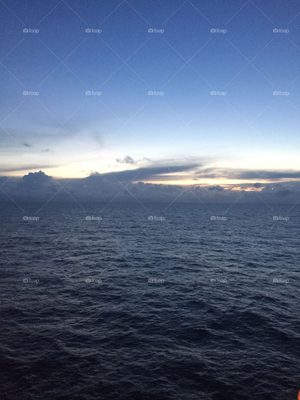 Photo taken of the last bit of light after sunset, 100 miles from land out in the Gulf of Mexico off of an oil platform. 
