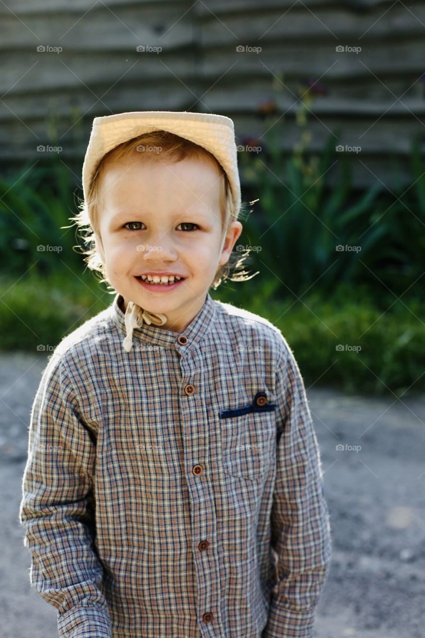 Portrait of charming smiling toddler boy 