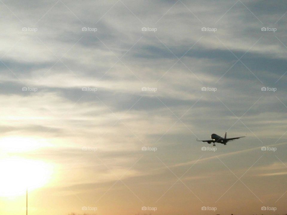 beautiful airplane flying cross the sky.