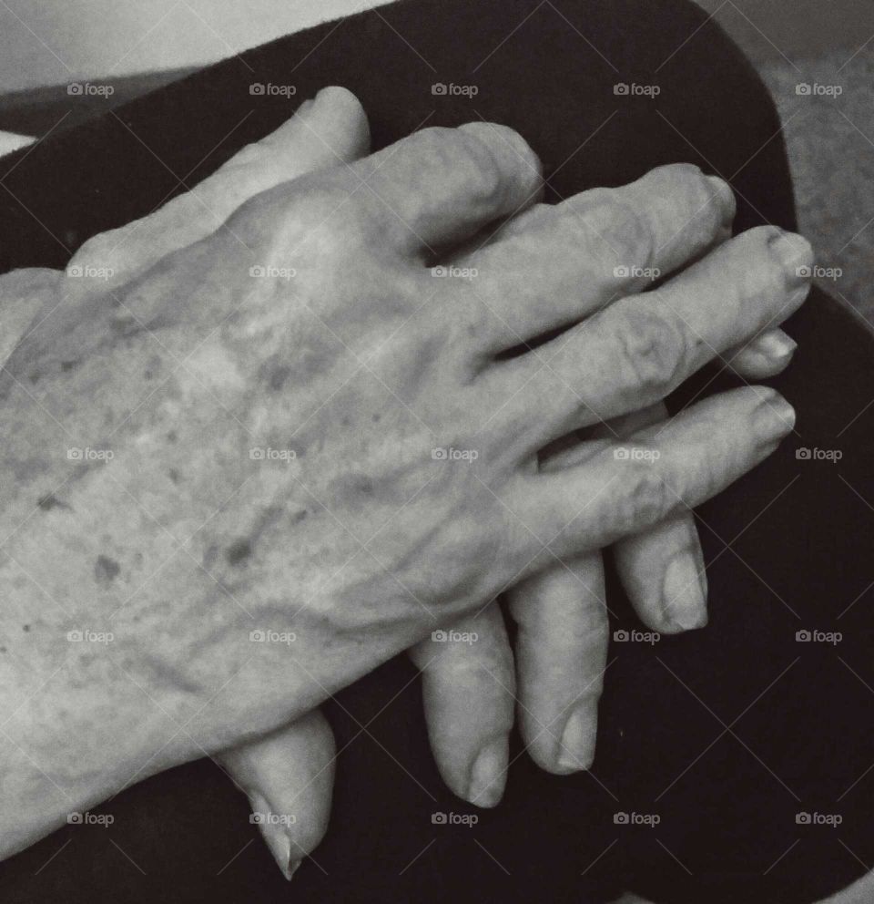 These hands show the years of wear and tear and hard work that my mother has done. All the age spots and dirt under her nails are from all the manual labor and hard work she does everyday.
