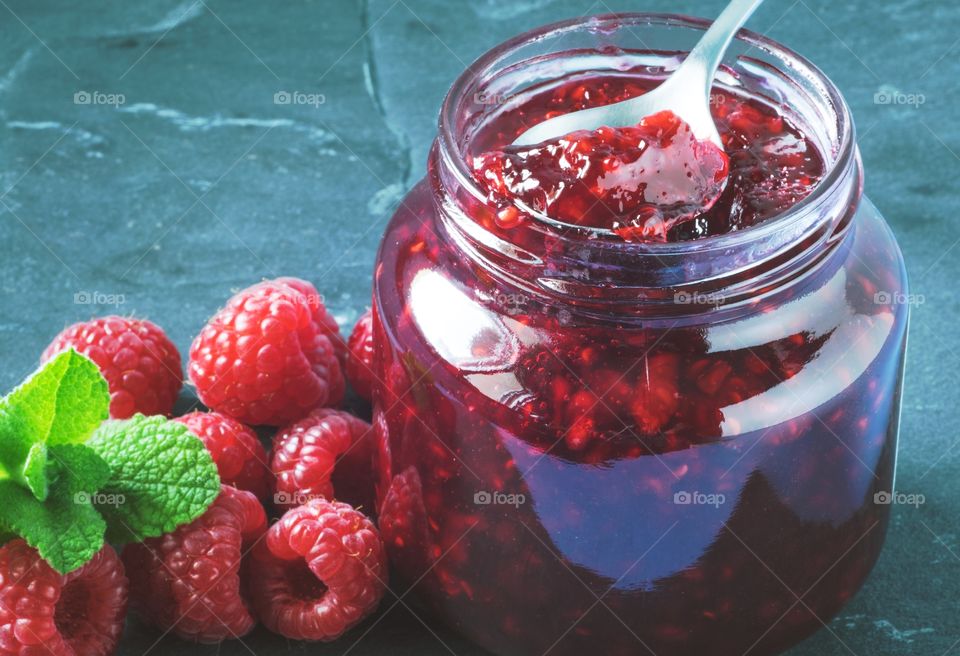 Close-up of raspberry jam in jar