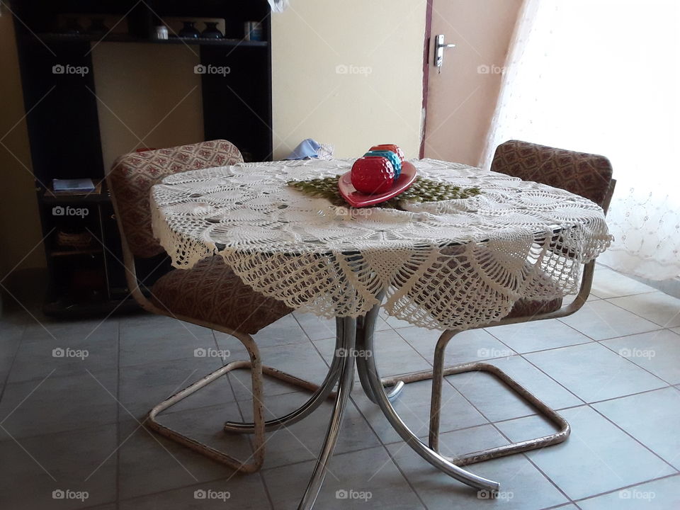 A table with a simple design in the sitting room.