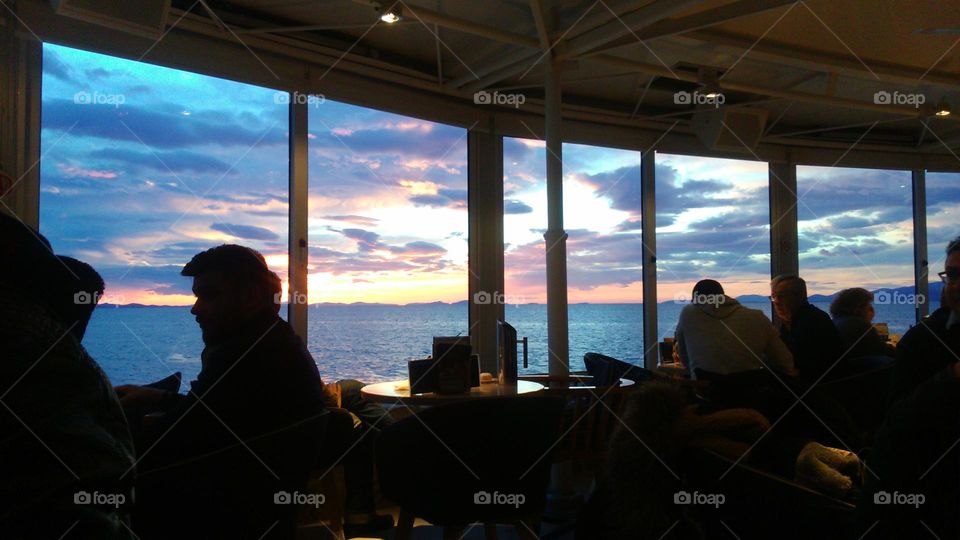 View of the sunset from inside a Caffe!