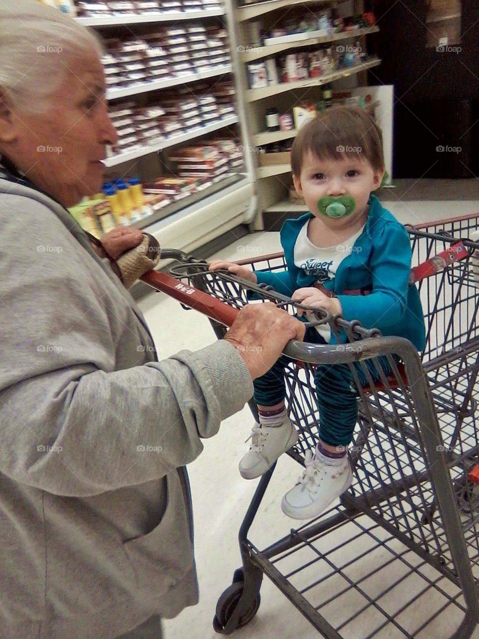 great grandmother great grandchildren girl women elderly shopping cart grocery smiling happy love