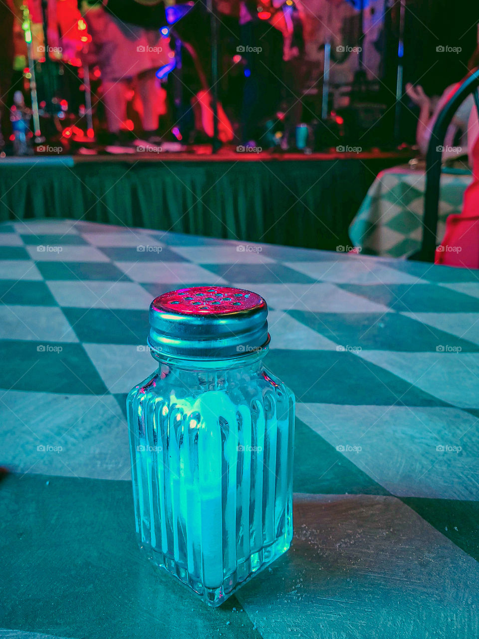 Sometimes creative inspiration takes over and you need to grab that sweet shot of the salt shaker with the band's lights reflecting on the cap.