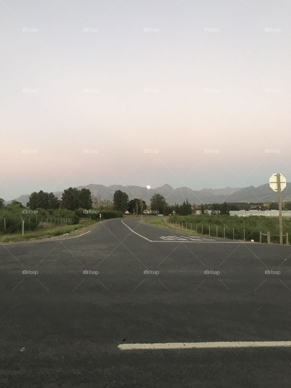 Sunrises, sunsets and the moon! Beautifully big moon just peeking out from behind the mountain.