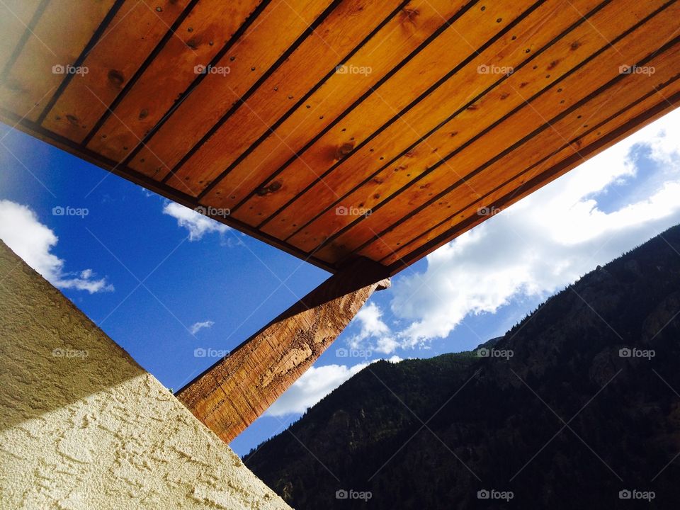 Blue sky and roof of balcony of Hotel Chateaux Chamonix on Clear Creek, Georgetown, CO