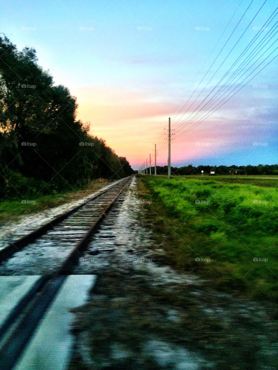 Sunset over train tracks 