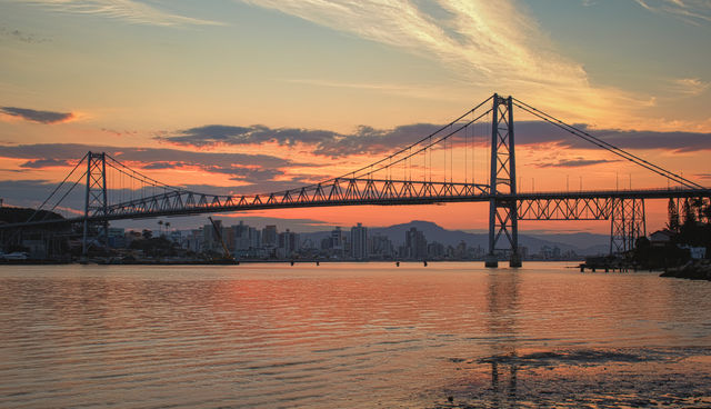 Sunset in Florianópolis, Santa Catarina - Brazil, with the Hercílio Luz Bridge in the background