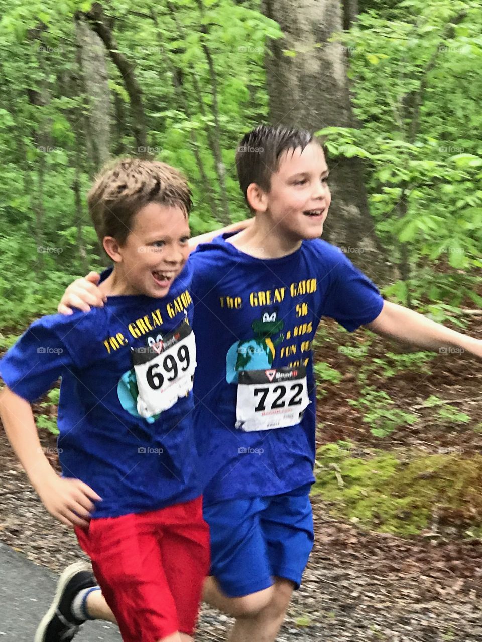 Boys run to finish line