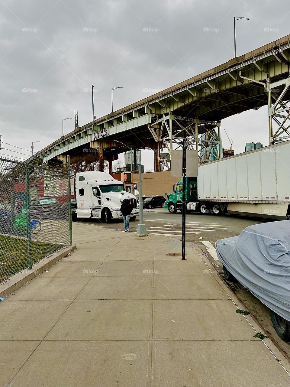 This is “Review Ave” at the intersection with “Borden Ave” and the “Borden Ave Bridge” at “Dutch Kills” in LIC, Queens. We are also looking at the unmistakably recognizable metal structure of the “Bklyn Queens Expressway”. 2023. Hypnotic Productions