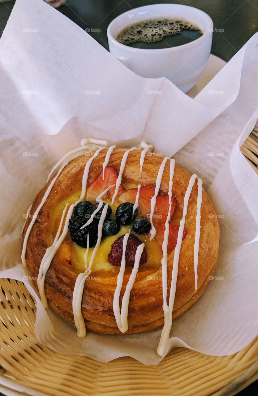 fruit Danish and coffee in local french cafe