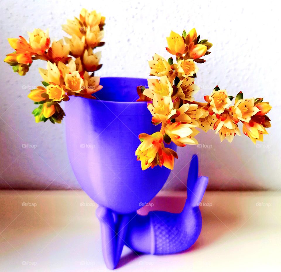 Maceta sirena y flores