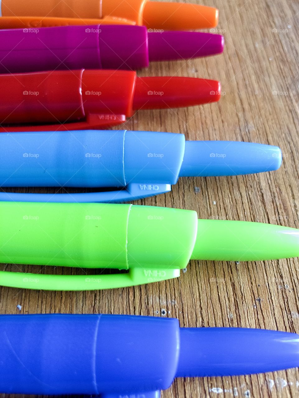 Macro view of felt tip pens on plywood 