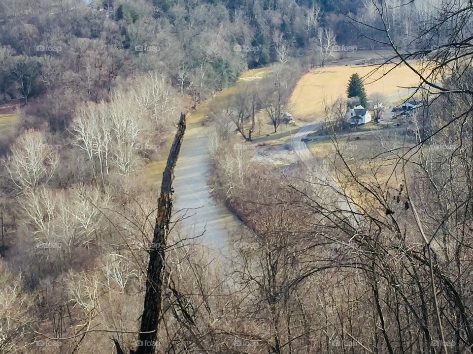 Beautiful view over top of small village  in Ohio on a cool winter day  also a view of a canal leading to the Ohio river 