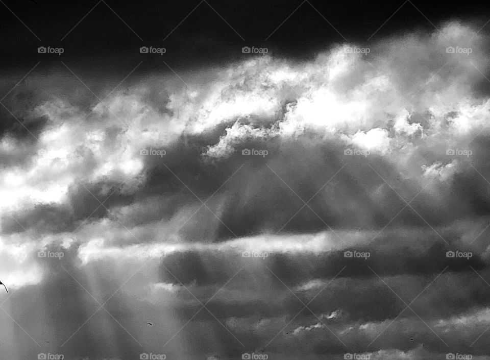 clouds and sunshine in Black and white