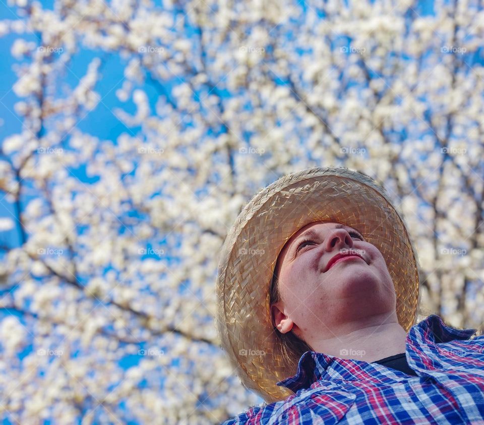 Seasonal selfie with a blooming tree