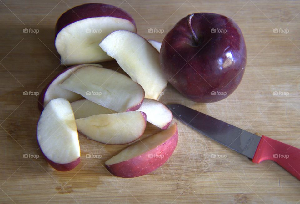 Slicing Apples on a Cutting Board