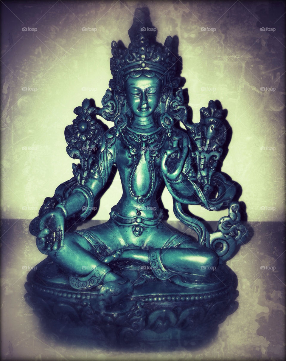 green religion buddhism figure by inmacasado