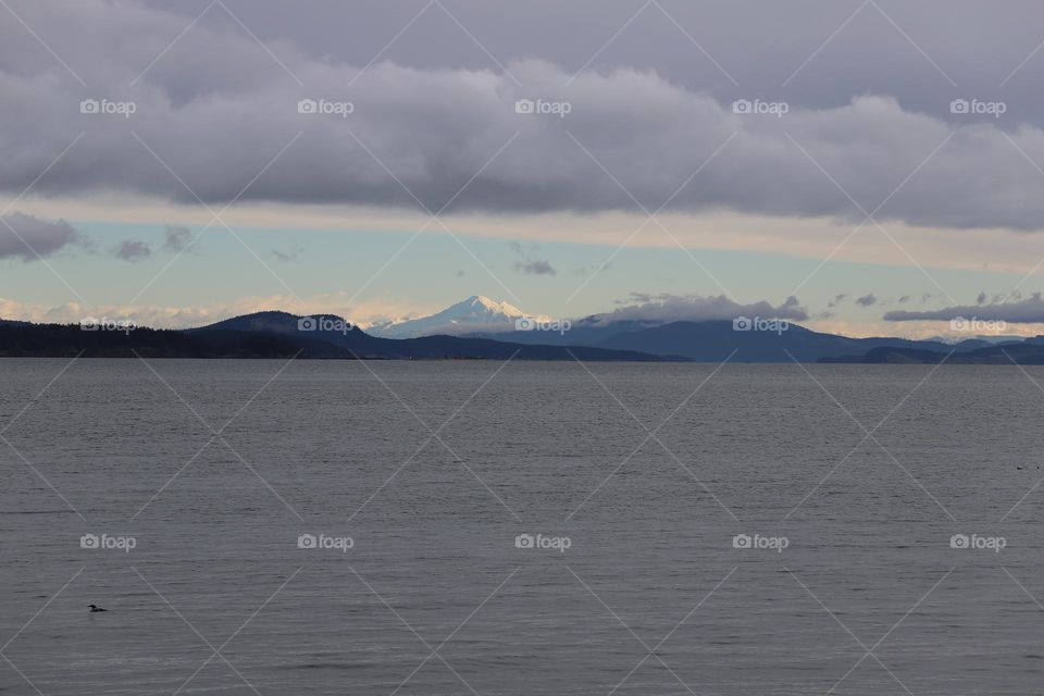 Ocean , mountain and clouds 