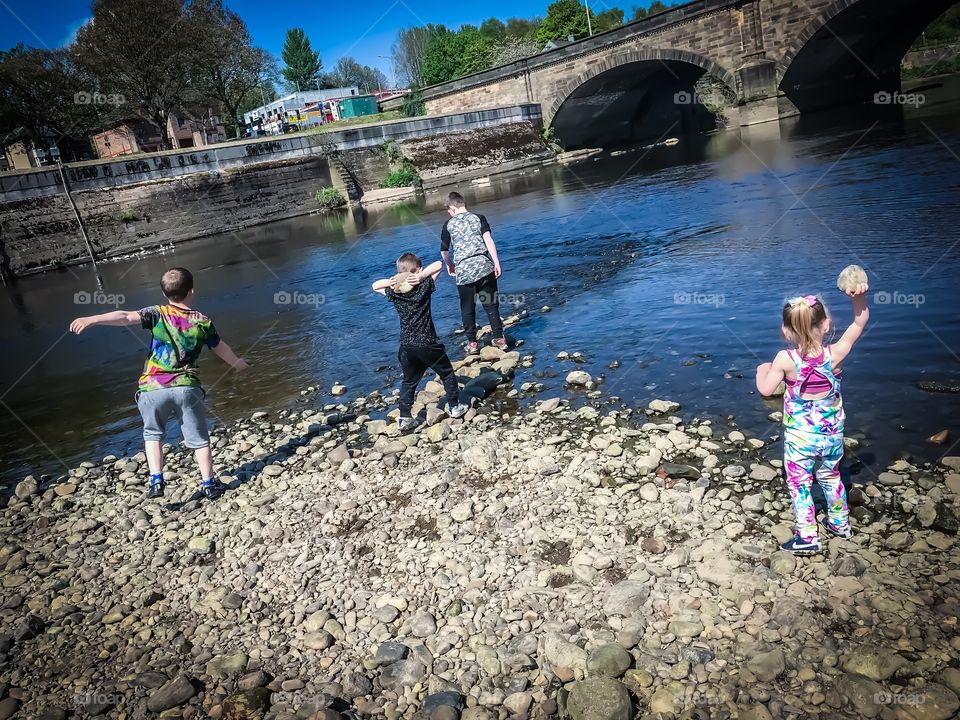 England Preston kids playing at river ribble 