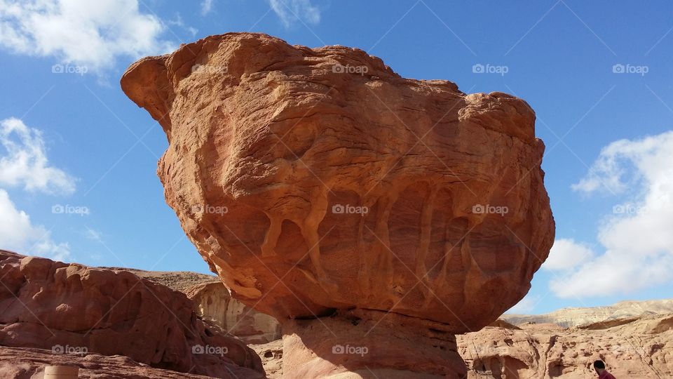 A Red Stone Impression