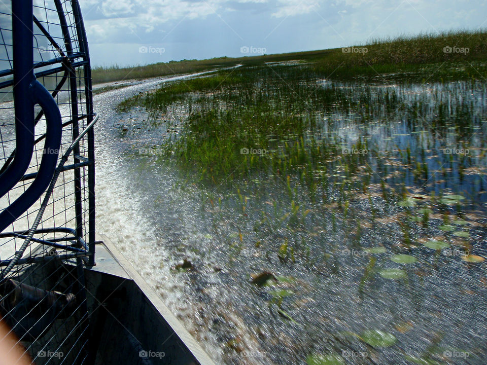 Airboat Speeding Through the Everglades