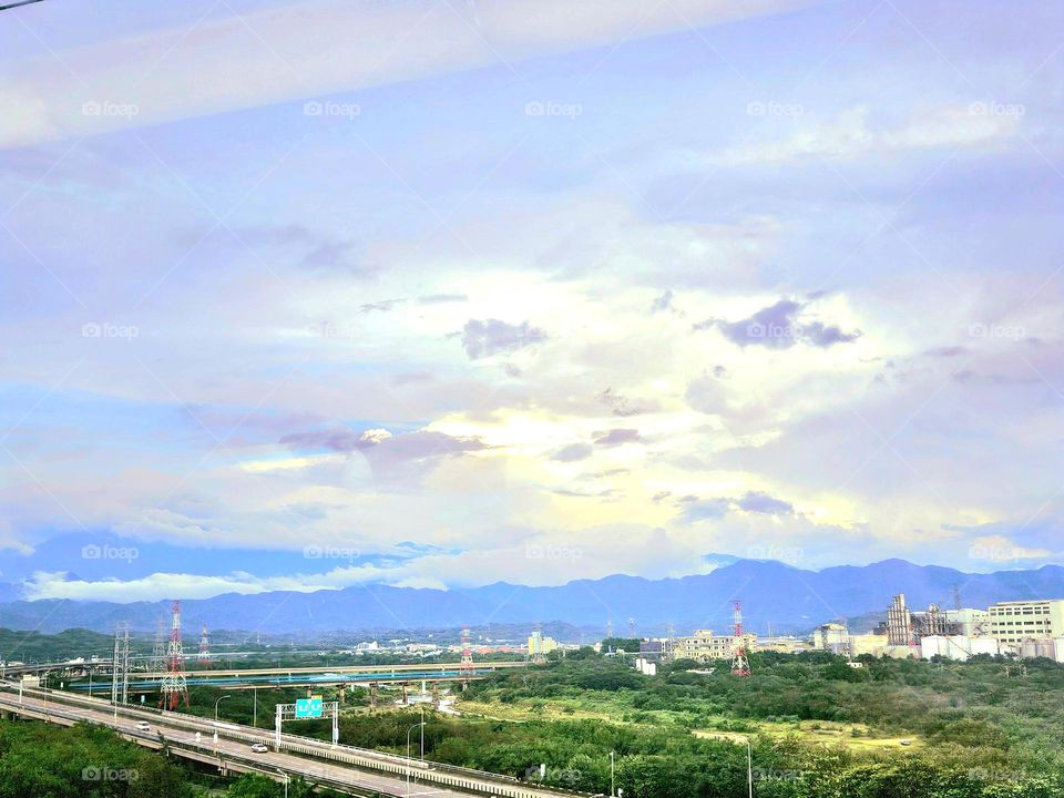 Looking at the beautiful scenery above the highway after the rain