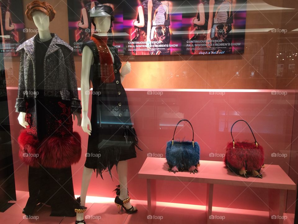 Designer fashion bags and fall winter outfits in Dubai mall.