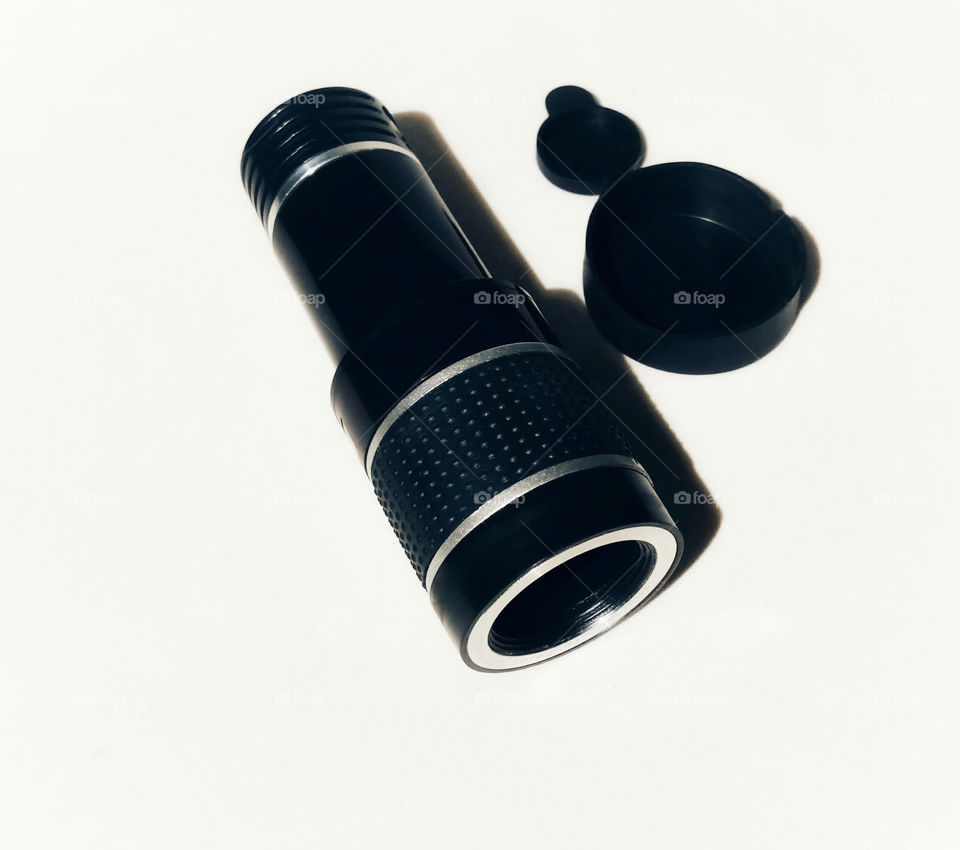 mobile phone telescope with white background
